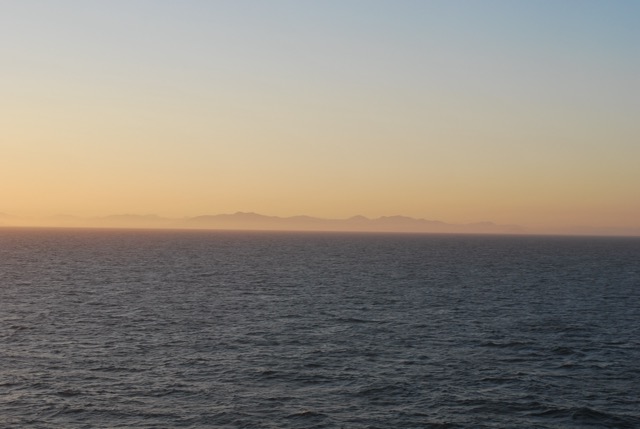 Sunrise 10.8.2022 with the Canadian coastline at the horizon